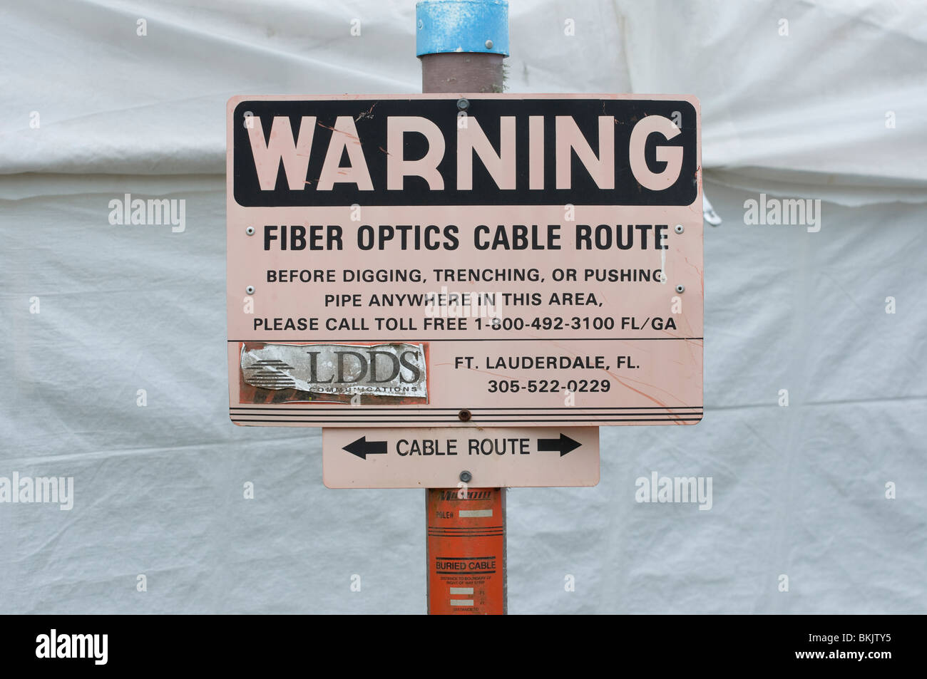 fiber optics cable route warning sign Stock Photo