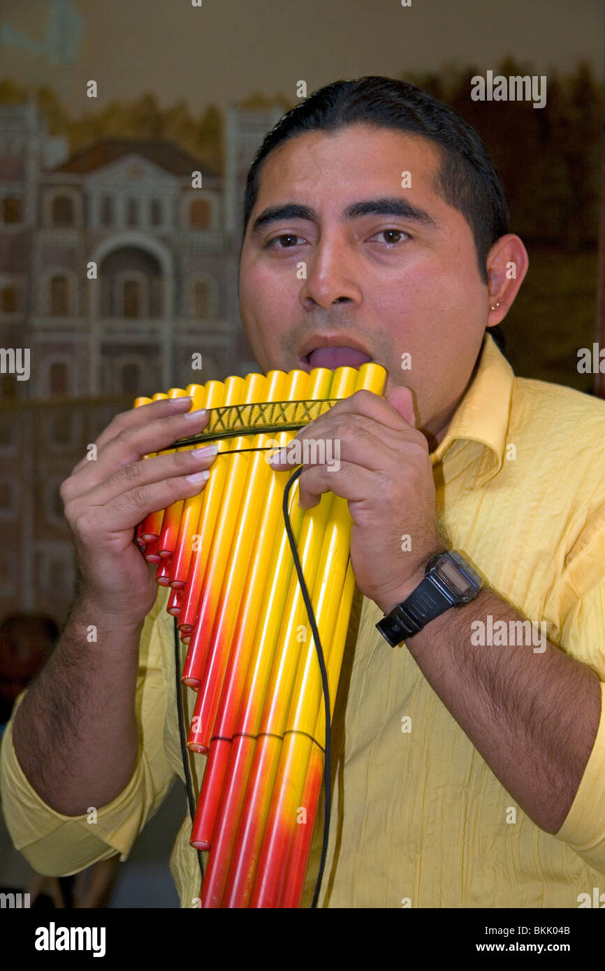 Musician playing a traditional panpipe in the city of Puebla, Puebla, Mexico. Stock Photo