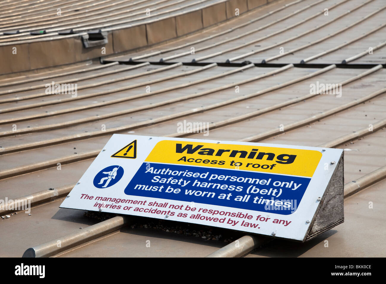 Warning sign on safety of roof Brighton England UK Stock Photo