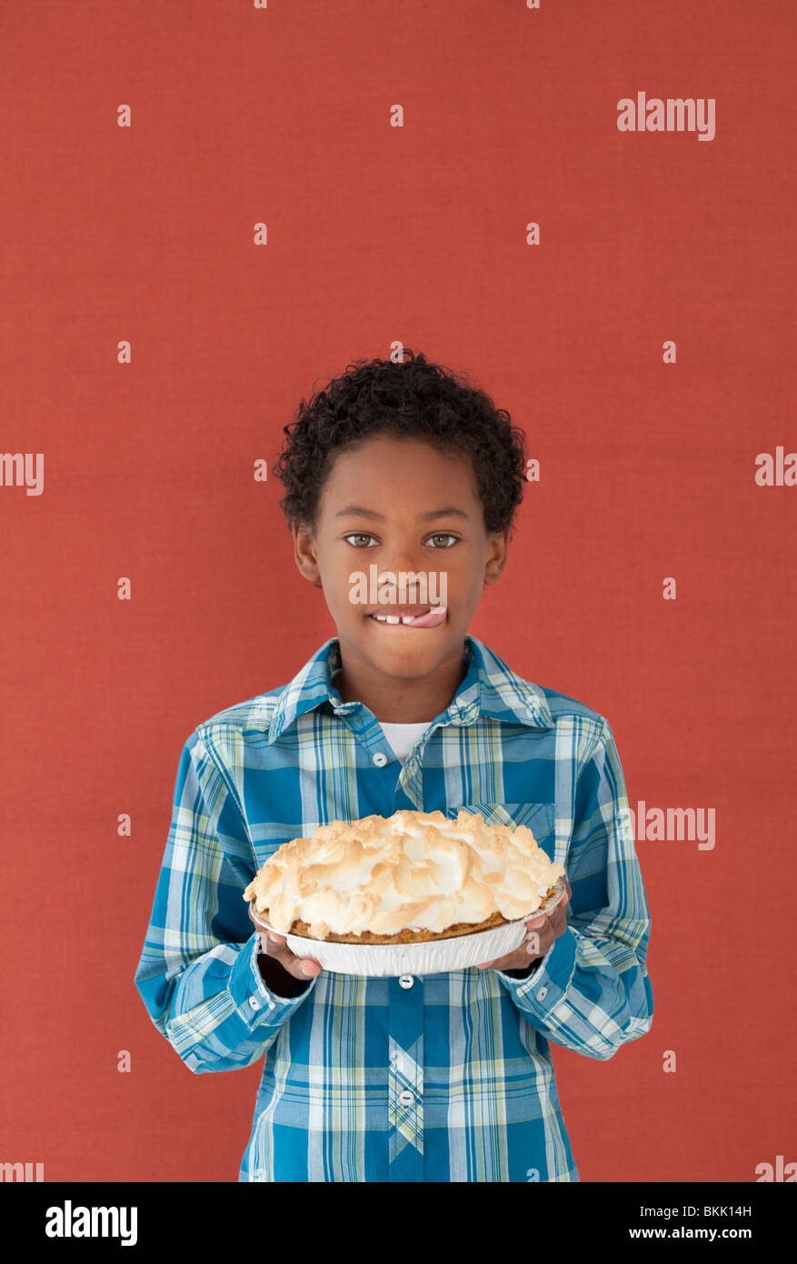 Boy with a Meringue Pie Stock Photo Alamy