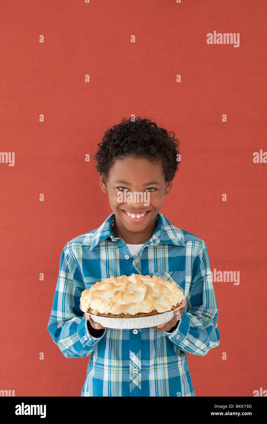 Boy with a Meringue Pie Stock Photo