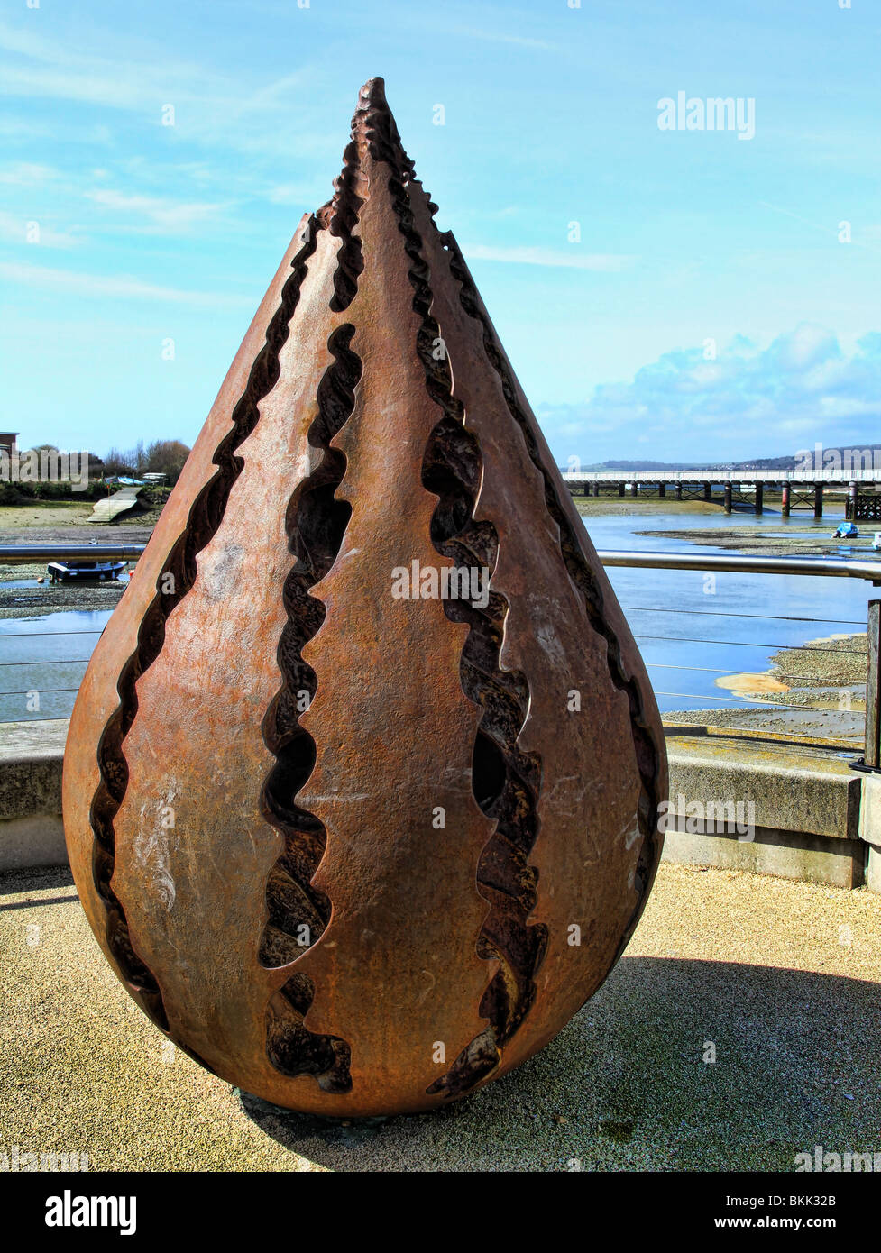 A cone shaped statue at a new residential area at Shoreham beside the river Adur. Stock Photo