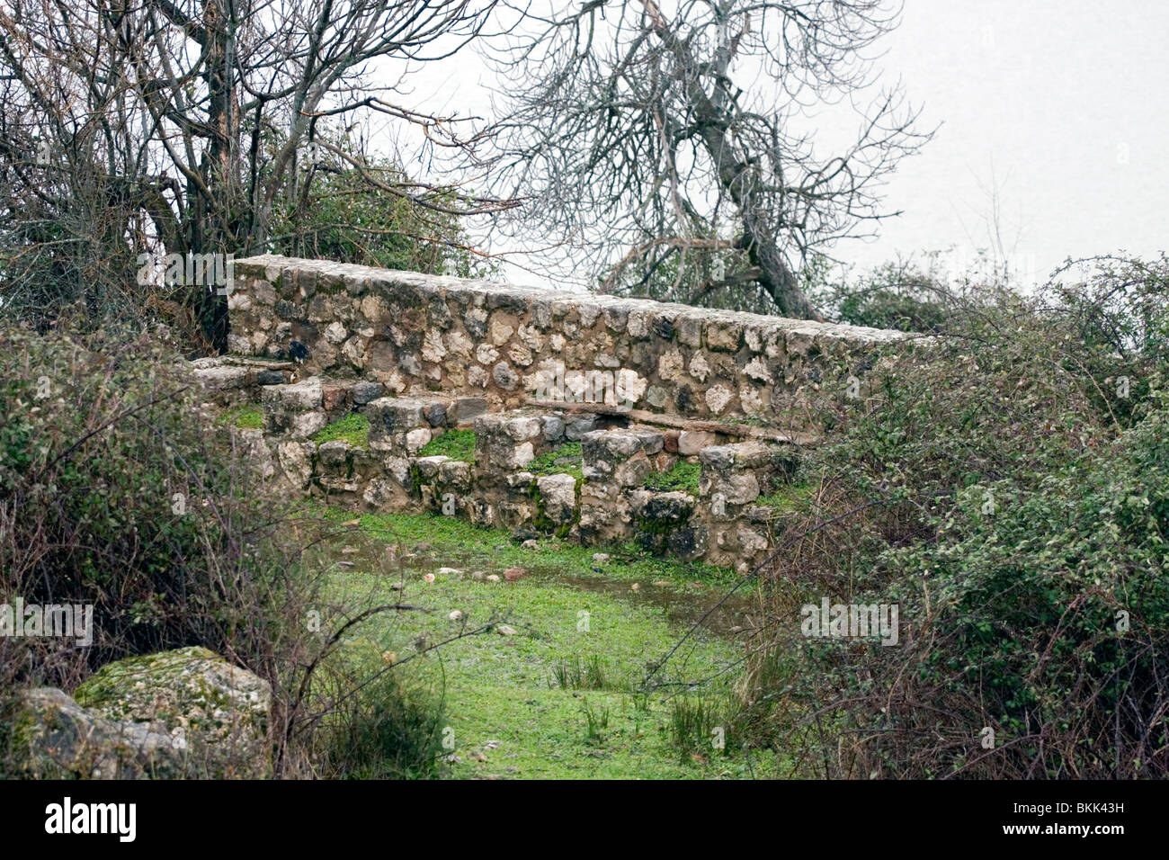 Ancient toilet block by lake, Cazorla, Andalucia Stock Photo