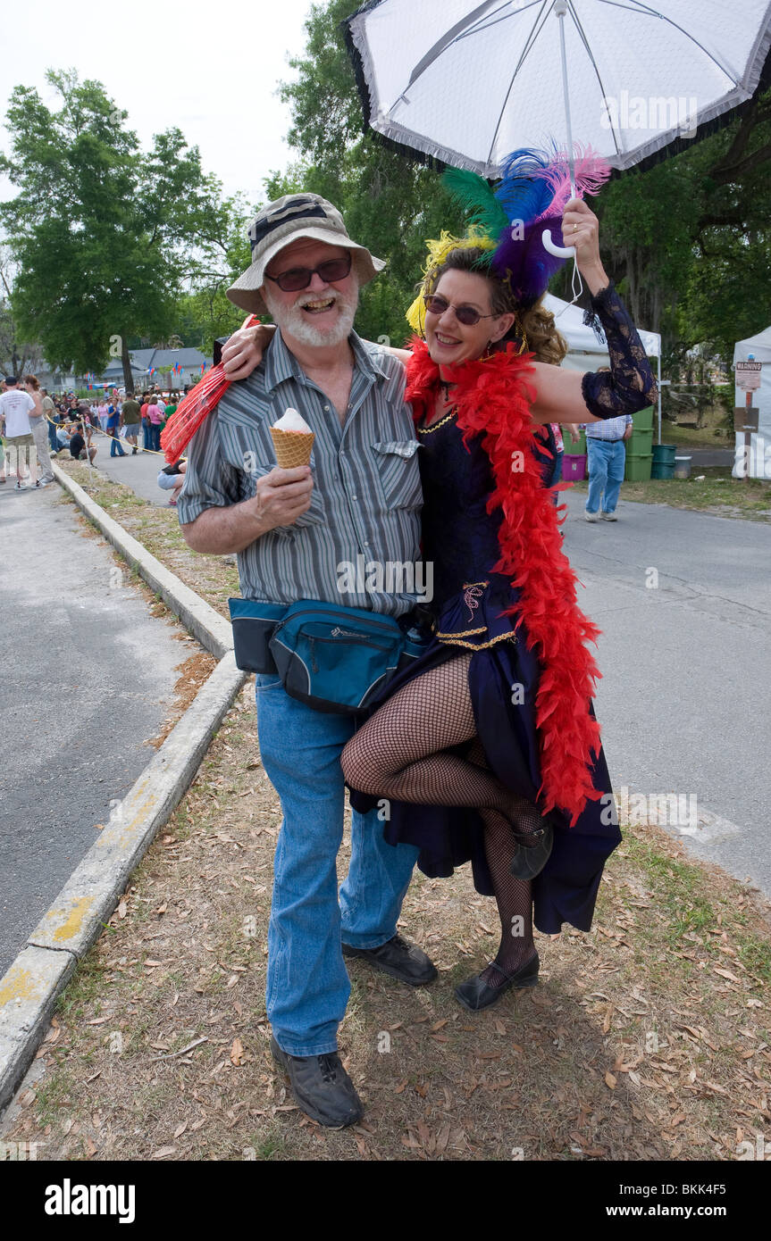 Pioneer Days High Springs Florida senior man is accosted by floozie showgirl Stock Photo