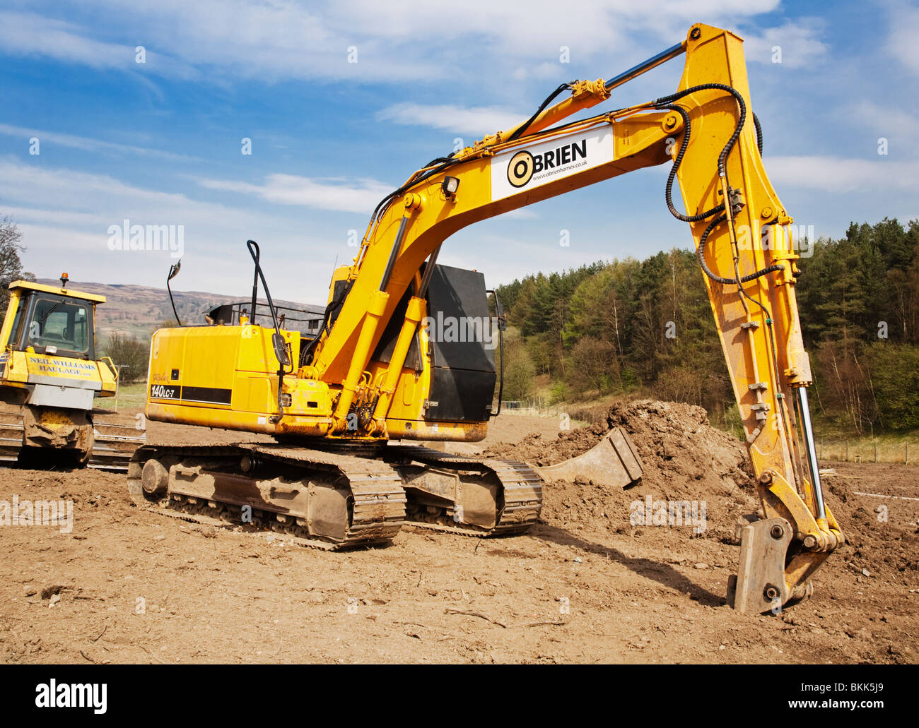 Hyundai 140LC-7 Robex Tracked Excavator with shutters over its windows on a construction site. Stock Photo