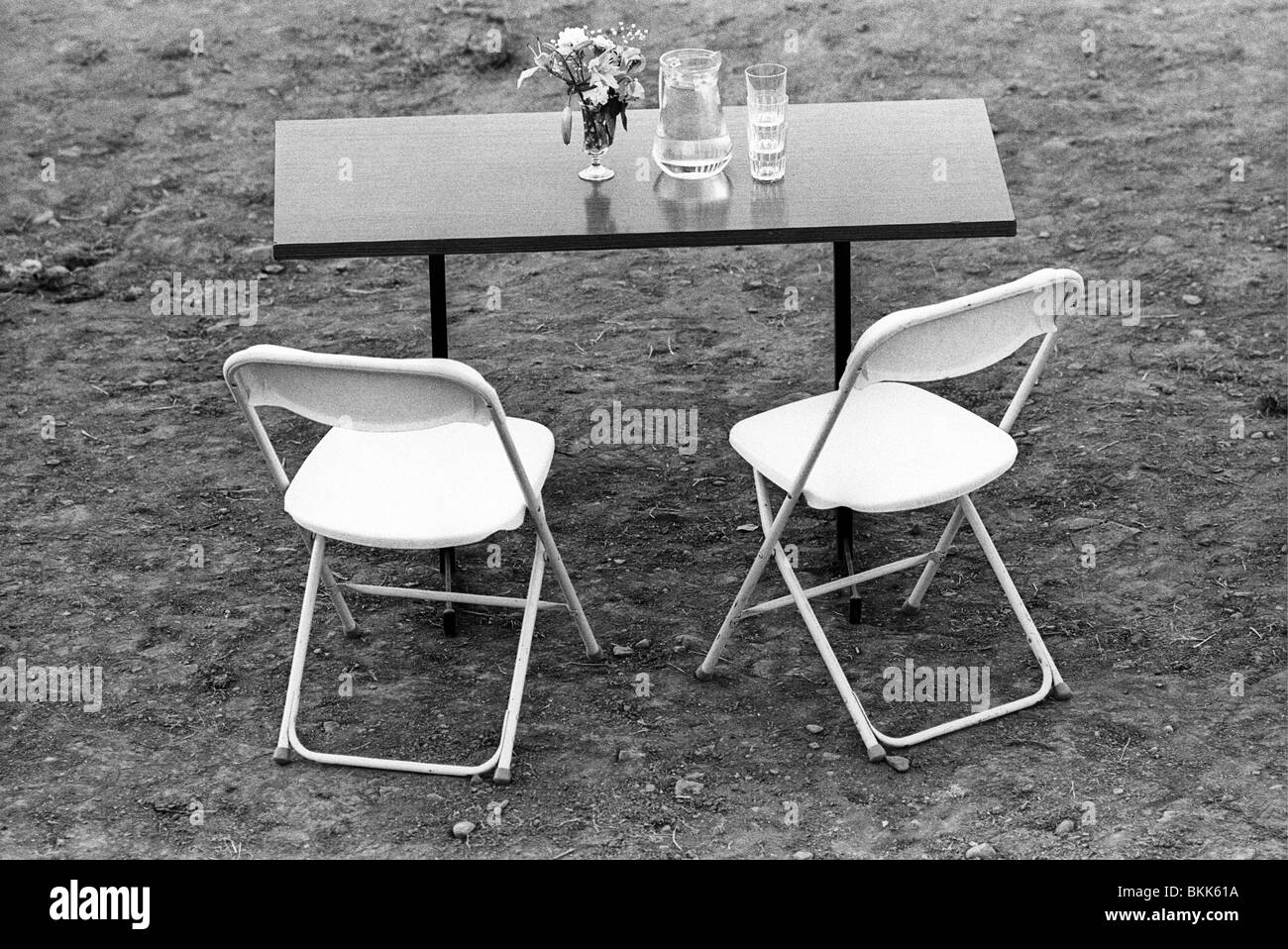 Table and chairs ready for book signing outdoors at 1992 Hay Literature Festival Hay-on-Wye Powys Wales UK Stock Photo