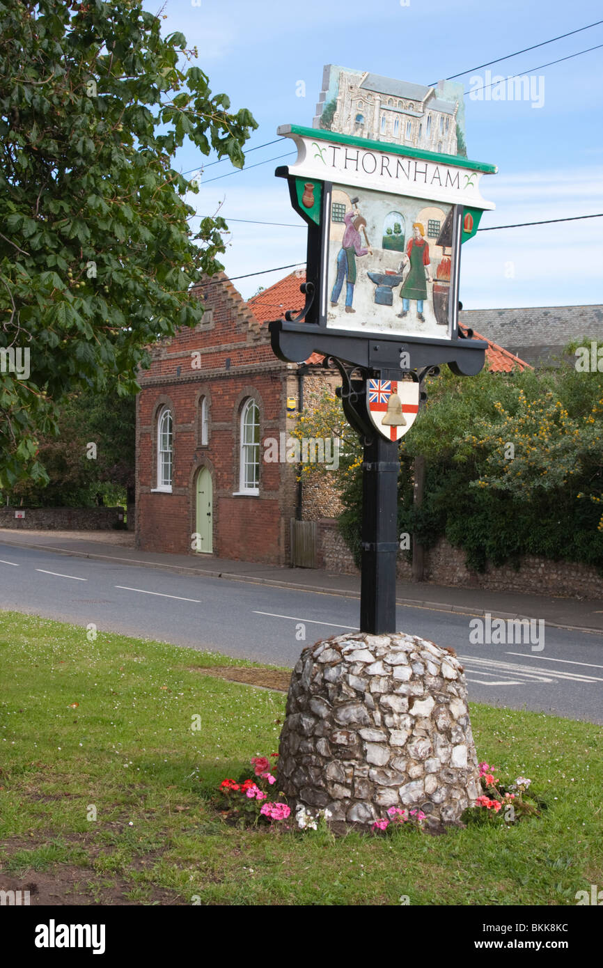 The village sign on the green in the middle of Thornham, North Norfolk, England Stock Photo