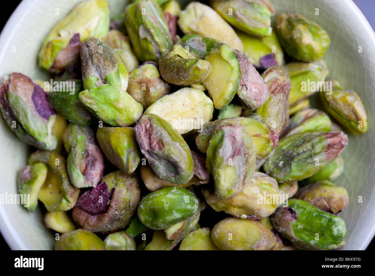 A pile of unshelled pistachio nuts Stock Photo