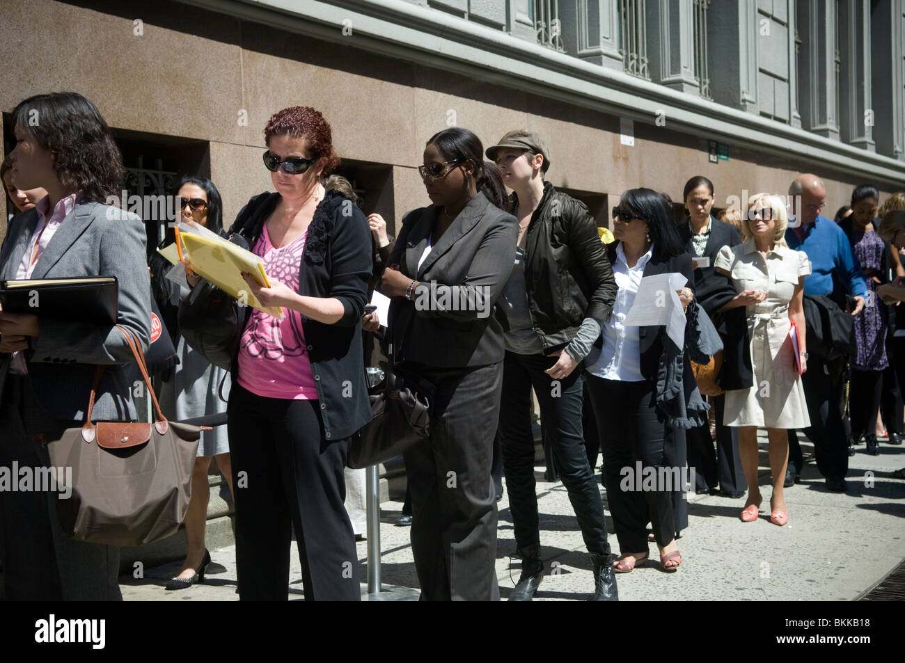 Job seekers line up fashion career job fair at the in New York Stock Photo