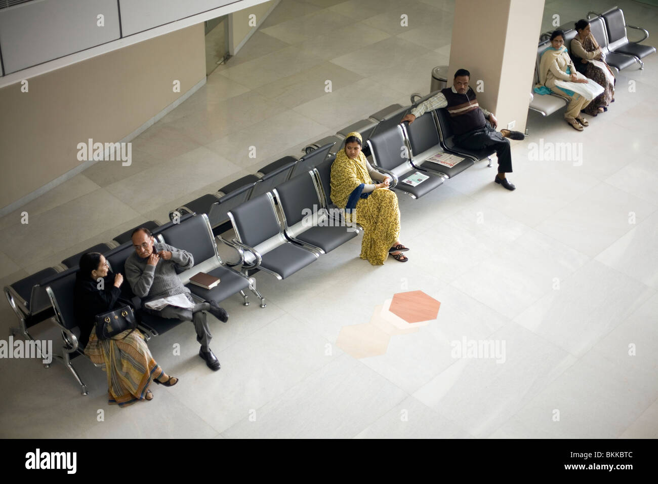 Patients wait in a waiting area at the Medicity Hospital, Gurgaon, India Stock Photo