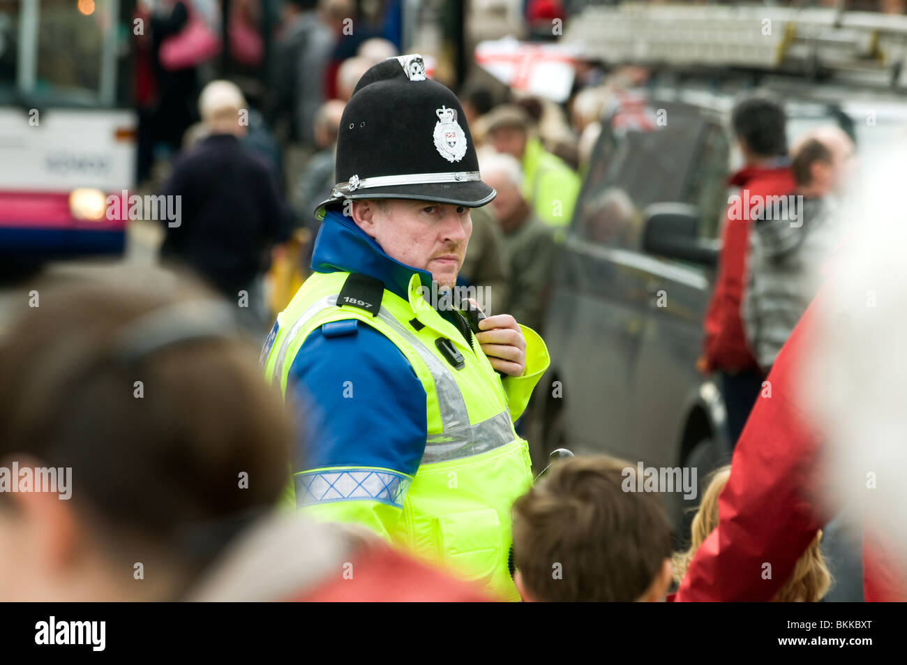 Policeman on duty in Bewdley in Worcestershire, England for a parade of returning Soldiers from Afghanistan in March 2010. Stock Photo