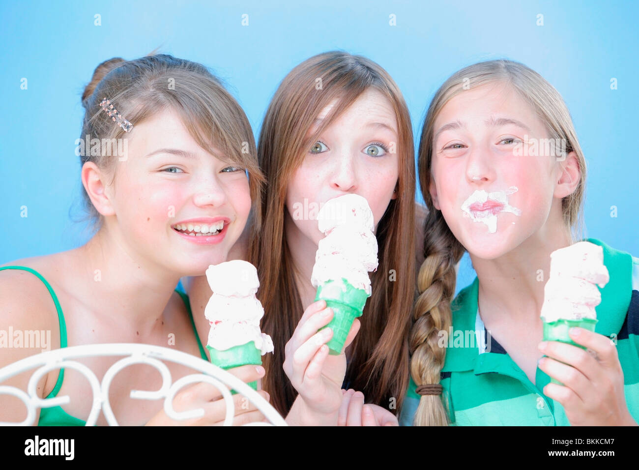 Three Girls Eating Ice Cream Cones Stock Photo Alamy