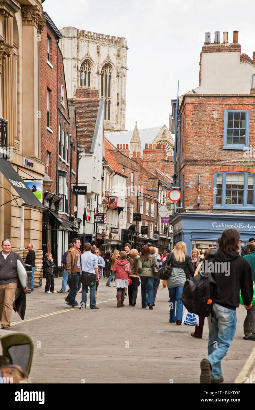 A bustling St Helen's Square looking towards Stonegate in the centre of York city, Yorkshire, Uk Stock Photo