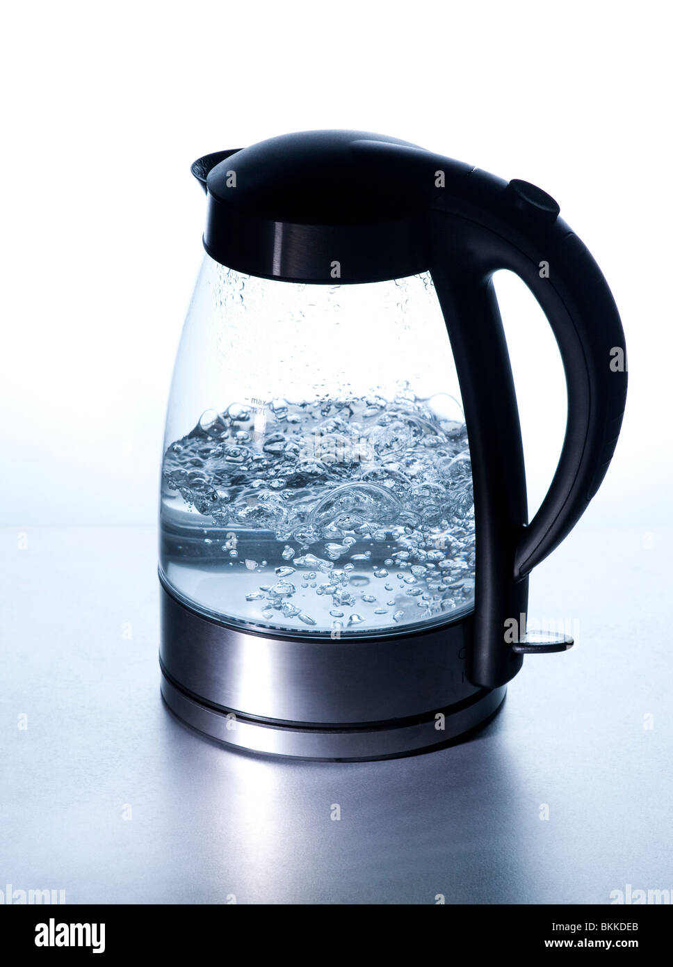 modern electric kettle boiling water using Schott Duran heatproof borosilicate glass Stock Photo