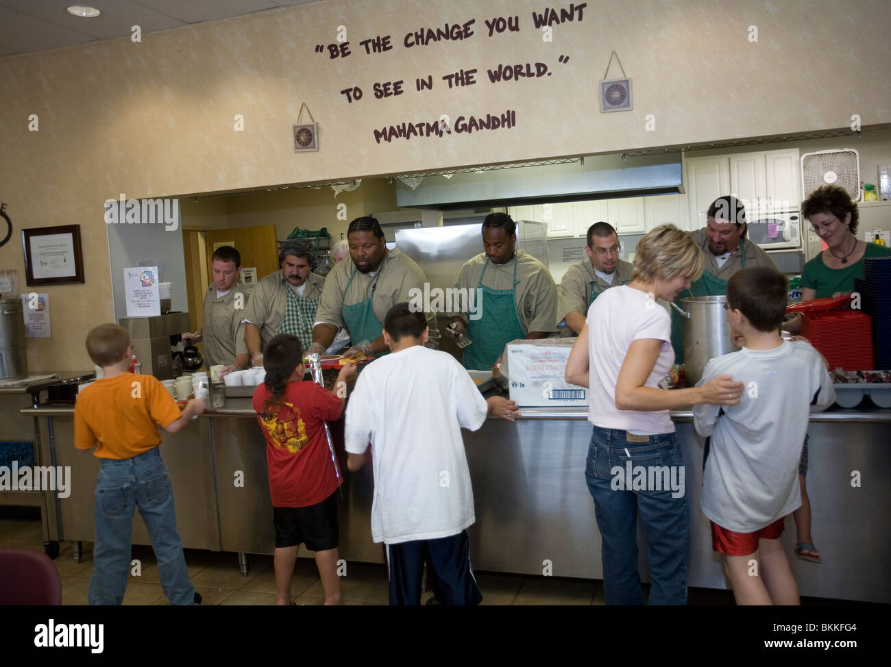 Inmates serving food at soup kitchen, Matt Talbot Kitchen, in Lincoln Nebraska, USA. Stock Photo