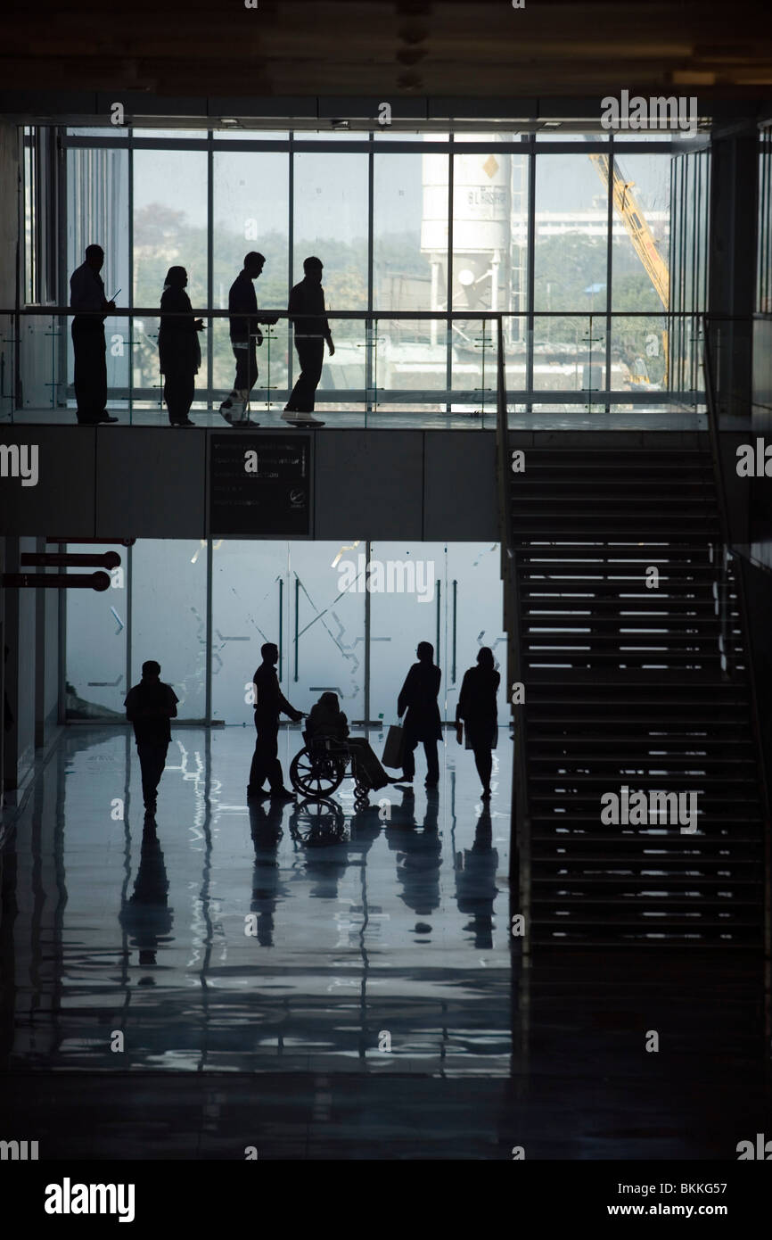 Patients silhouetted against the skyline at the Medicity Hospital, Gurgaon, India Stock Photo