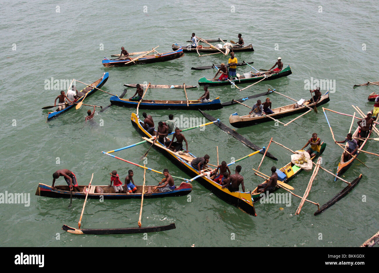 starving african family and kids in boats asking for food,madagascar,africa Stock Photo