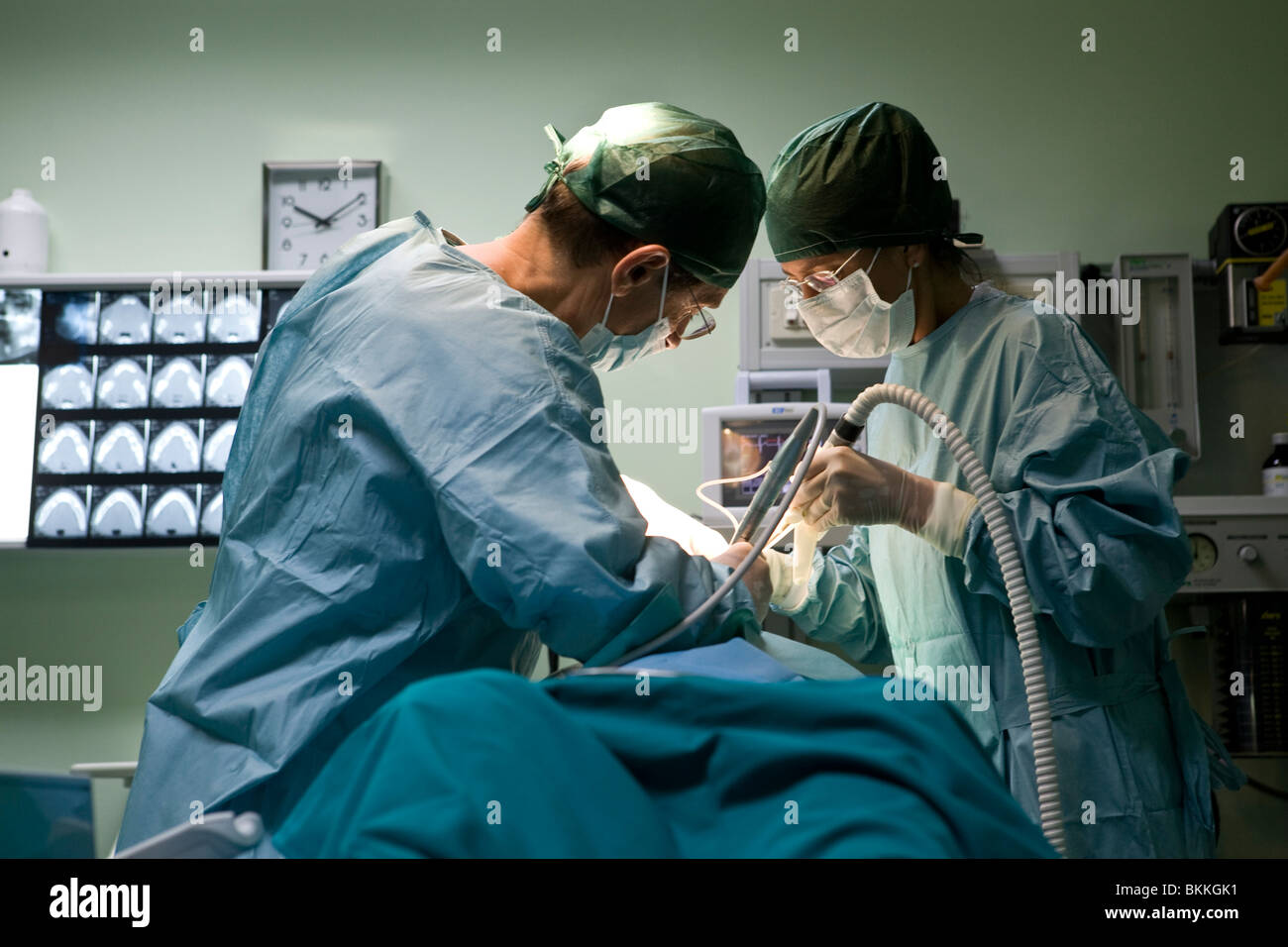 surgeon performing operation Stock Photo
