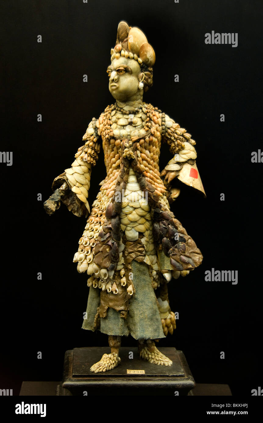 Female figures of shells brown paper carton China 1700 Chinese Museum Madrid Spain Stock Photo