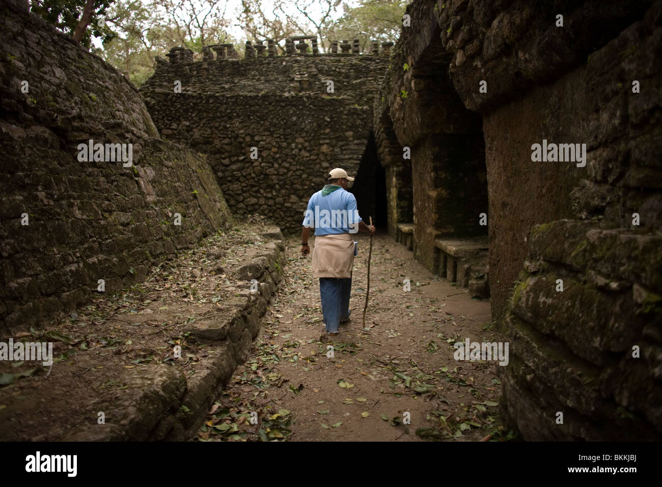 A tour guide walks enters the Labyrinth in Building 19 at the ancient Mayan city of Yaxchilan 