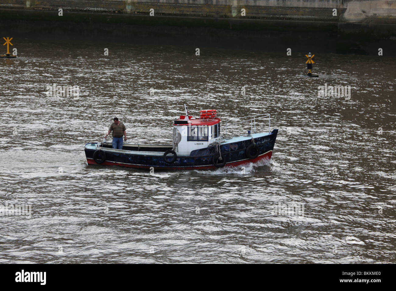 Small boat on river Themes in London Stock Photo Alamy