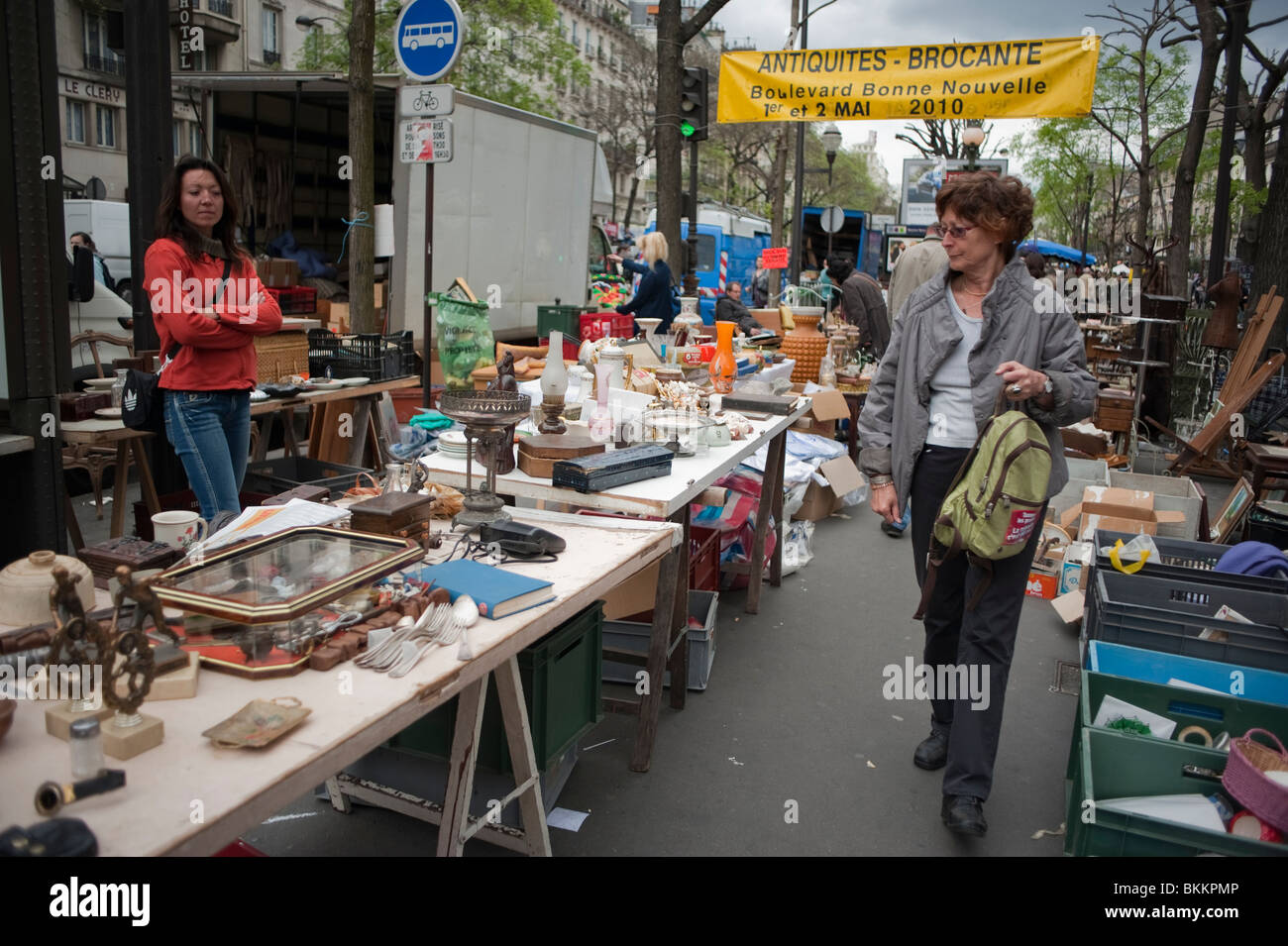 People Shopping For Second Hand Household Objects On Street Garage Sale Stalls Paris France Stock Photo Alamy