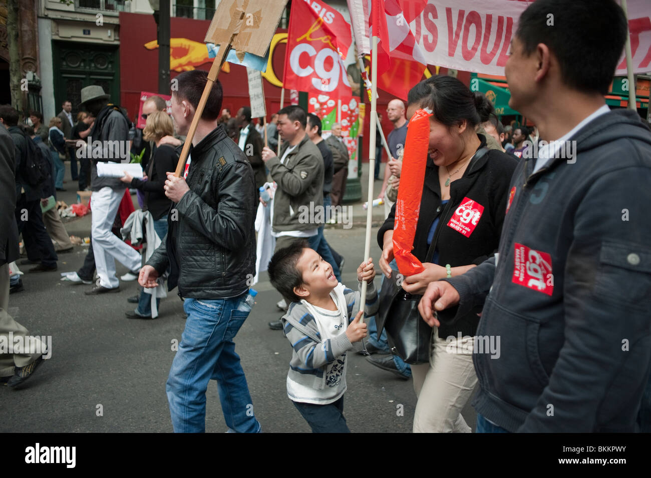 France's leading trade unions with Chinese Migrant Immigrants Family protest, Demonstrating in labor day may Demonstration, Paris, 'Sans papiers' illegal aliens, CGT, workers protests, immigrants rights, protesters multiracial human rights, illegal migrants Stock Photo