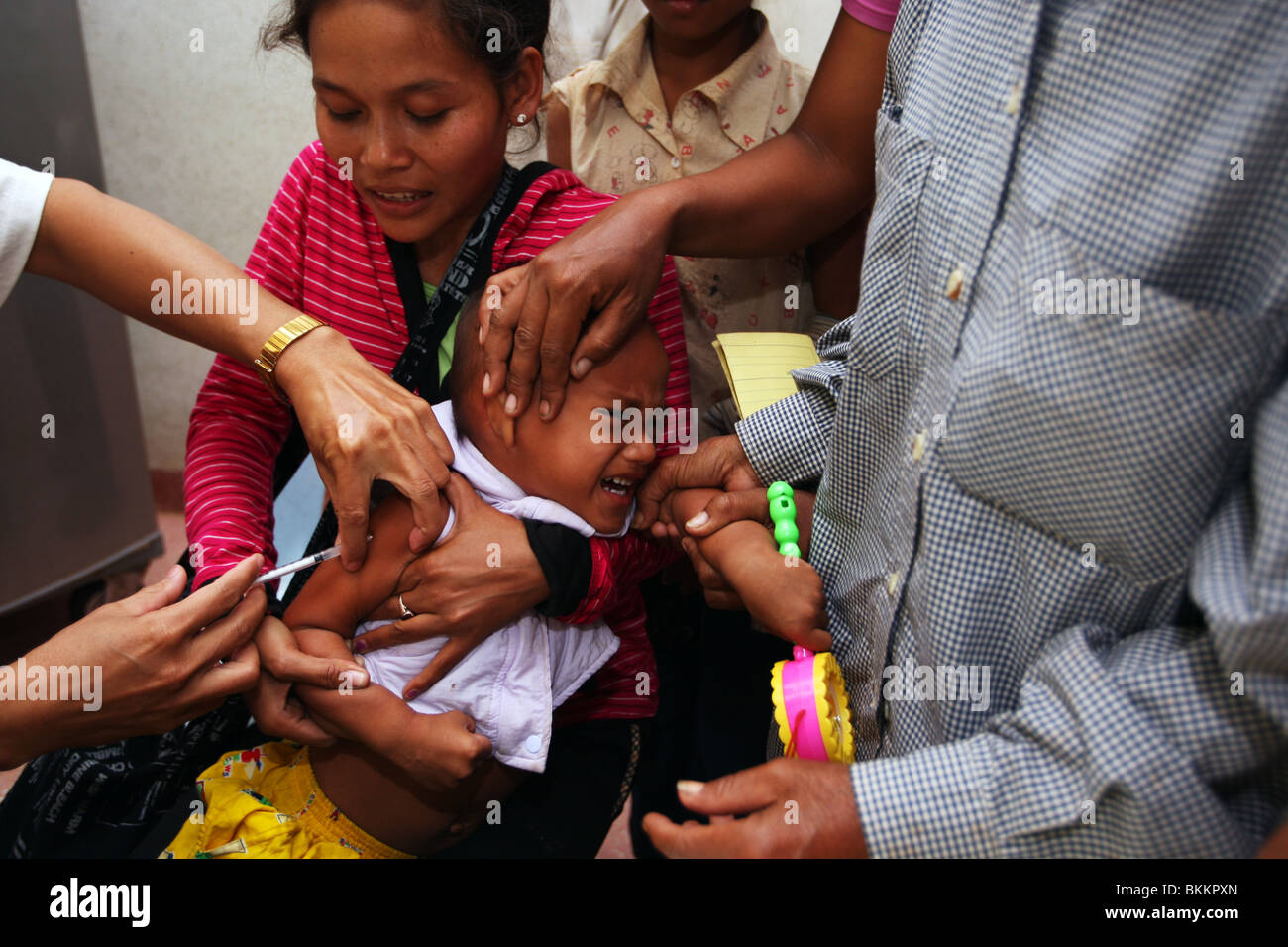 A Cambodian child is inoculated for TB at Dr Beat's hospital, Jayavarman V11 Hospital, Siem Reap, Cambodia. Stock Photo