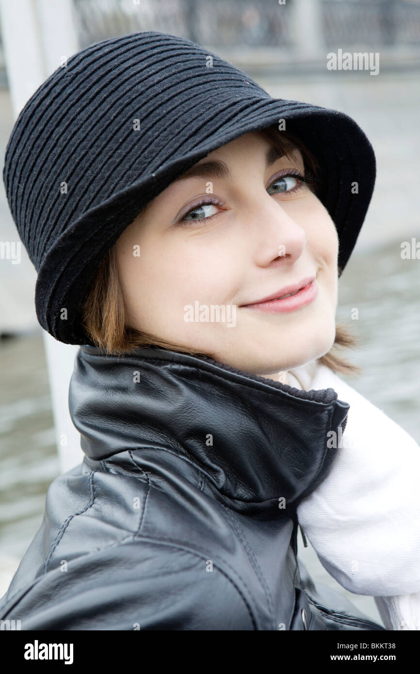 portrait smiling young woman in hat Stock Photo - Alamy