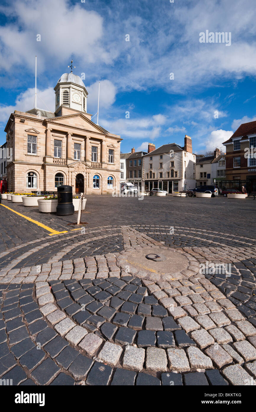 The old bull ring set in the cobbles of the market square of Kelso, the largest town square in Scotland. Stock Photo