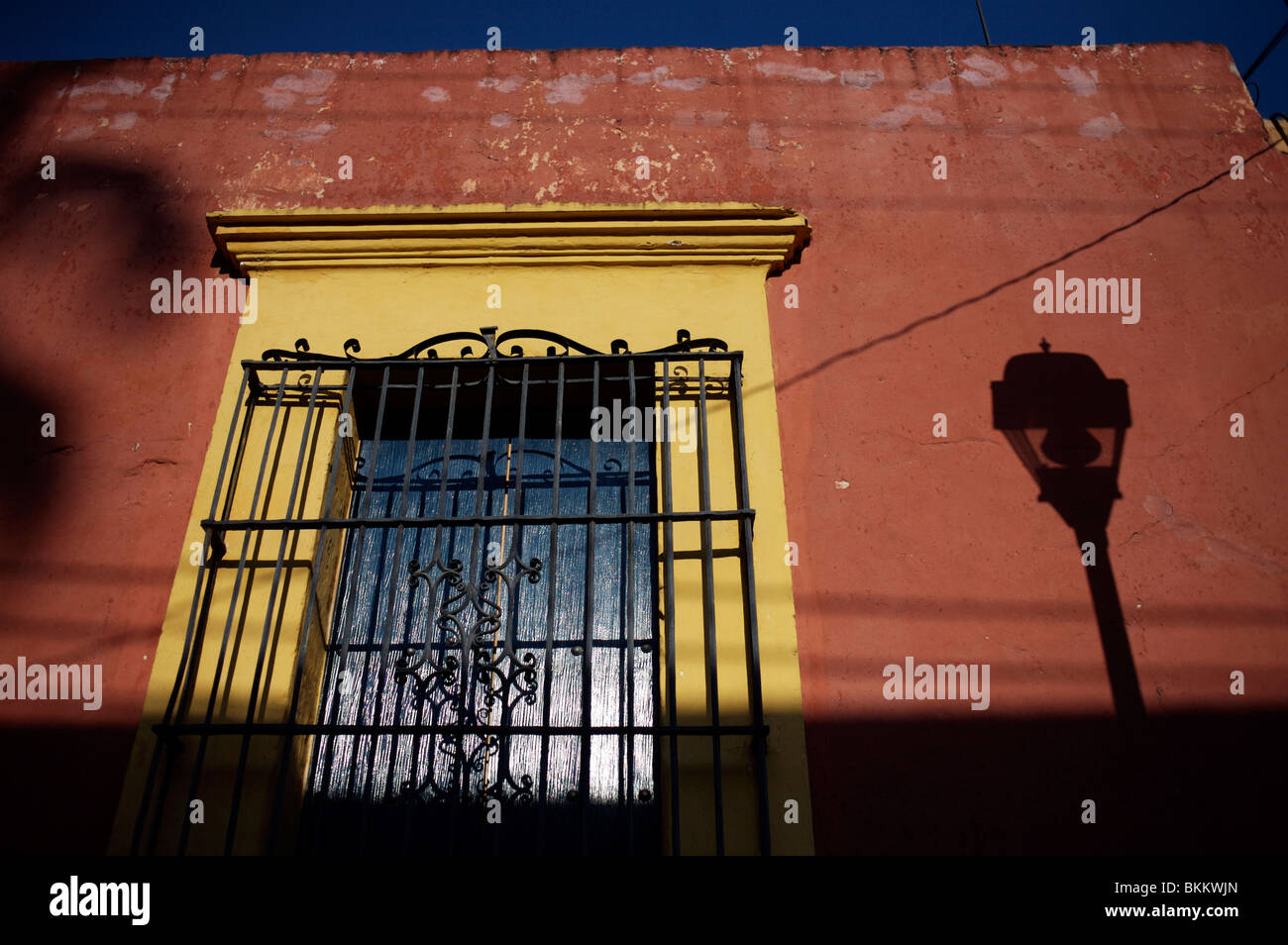 A street lamp casts a shadow on a wall in Oaxaca, Mexico, April 12, 2009. Stock Photo