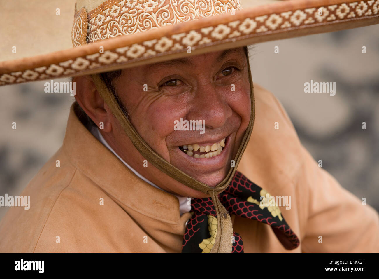 A Mexican Charro smiles during a charreria exhibition in Mexico City, Mexico Stock Photo