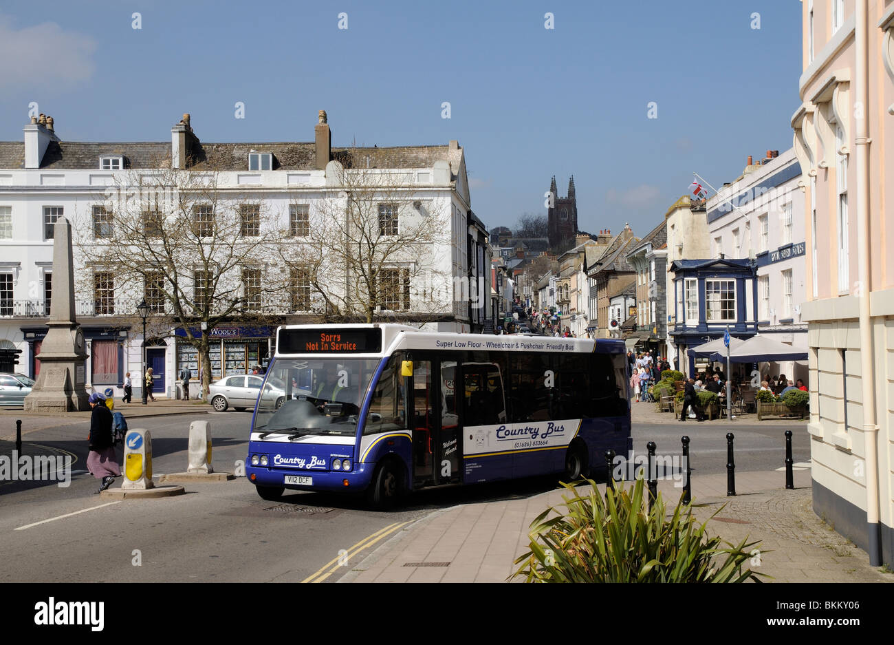 Totnes town centre shops South Devon England UK and a Country Bus low floor vehicle Stock Photo