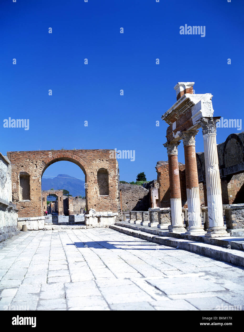View of Celebratory Arch showing Mount Vesuvius, Ancient City of Pompeii, Pompei, Metropolitan City of Naples, Campania Region, Italy Stock Photo