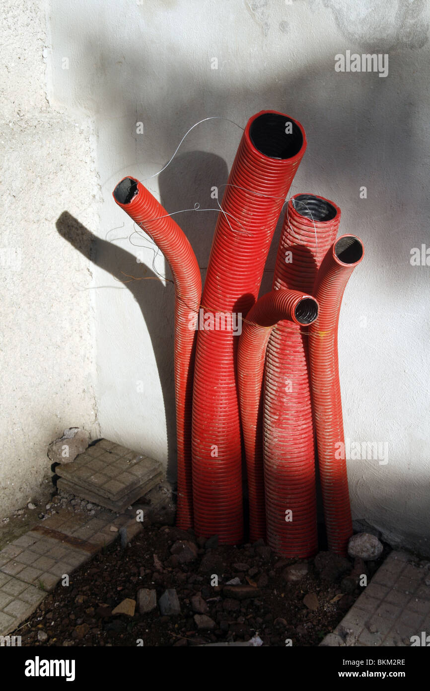red plastic tubes on building site Stock Photo Alamy