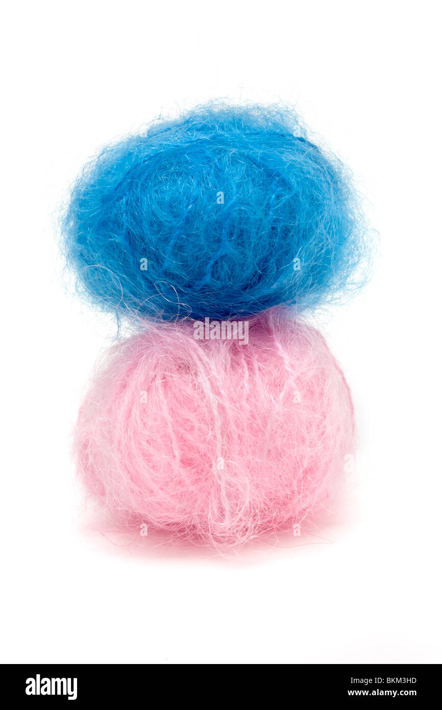 Pink cotton wool on a blue background. A soft pile of fibre.Piece Cotton  wool isolated on blue 19874792 Stock Photo at Vecteezy