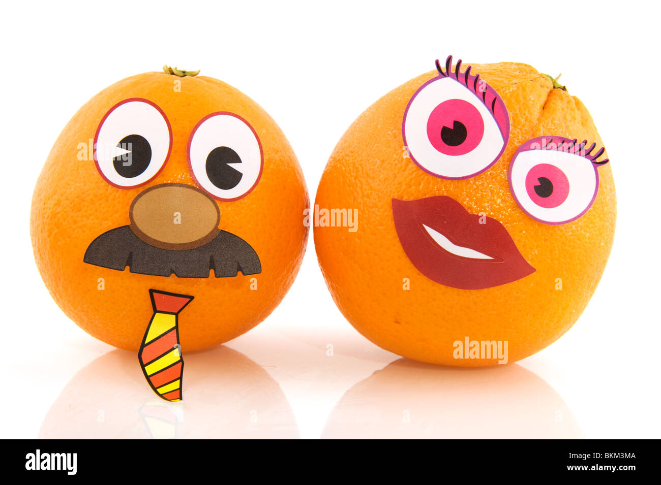 Funny faces are a fruit couple from oranges Stock Photo Alamy