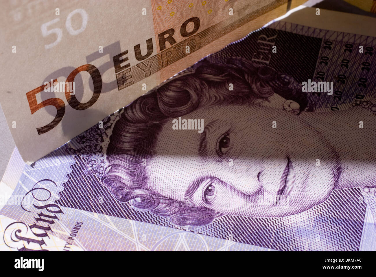 Sterling twenty pound note with euro note currency of united kingdom and Eurozone Stock Photo