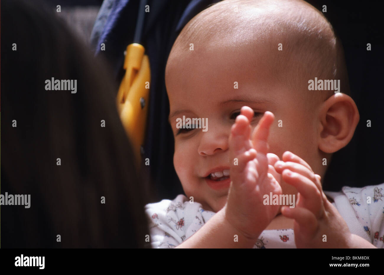 Baby clapping hands game Stock Photo Alamy