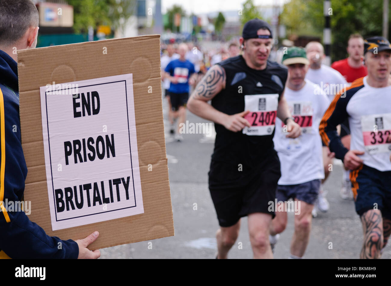 A 'white line picket' along the Falls Road during the Belfast Marathon, protesting at conditions for republican prisoners Stock Photo