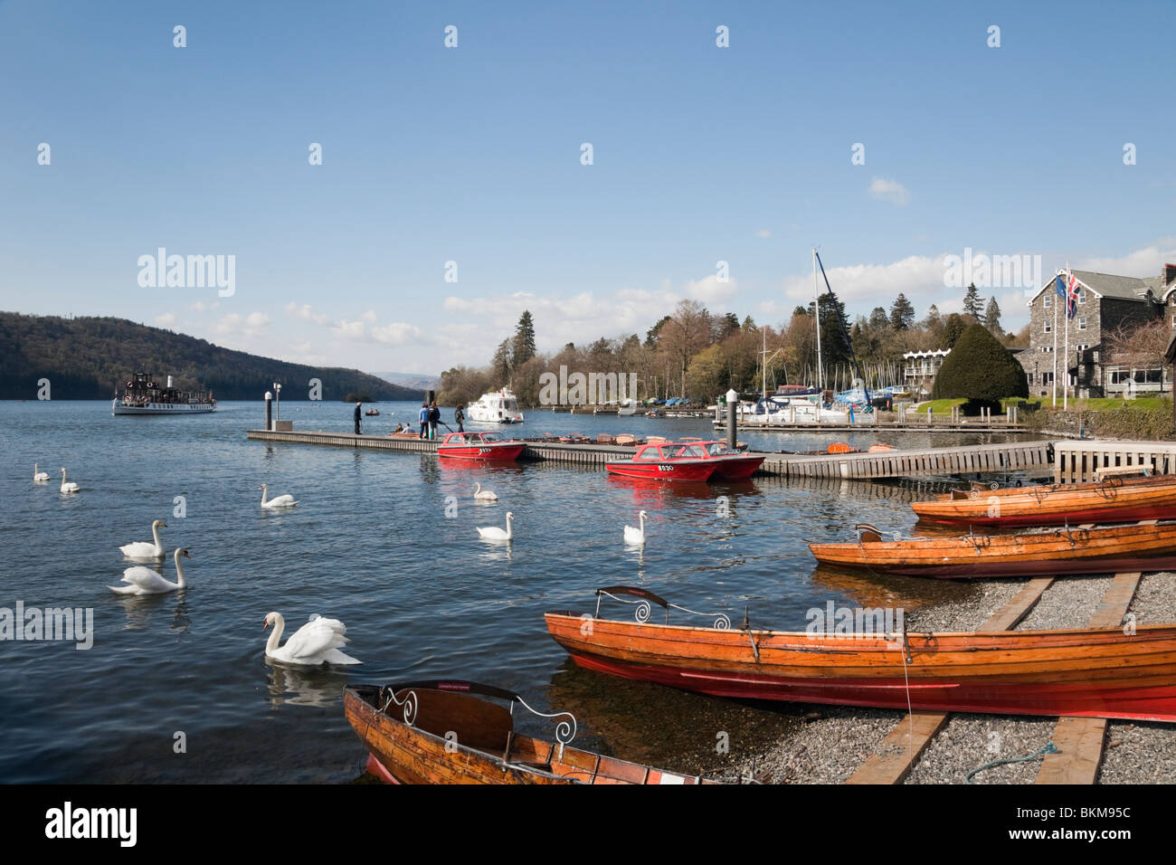 Rowing boats for hire on Lake Windermere lakeside in the Lake District National Park. Bowness on Wndermere, Cumbria, England, UK, Britain Stock Photo