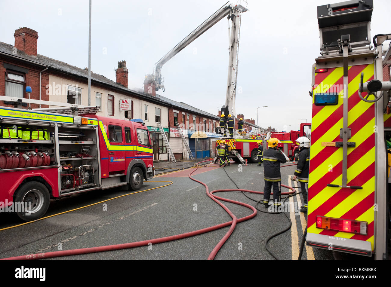 High street shop on fire Stock Photo - Alamy