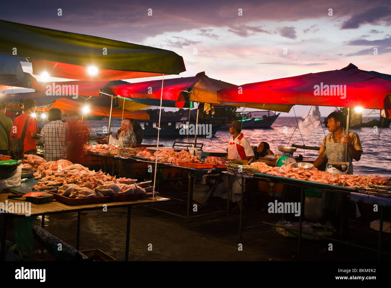Poultry stalls at the open air Night Market on the waterfront. Kota Kinabalu, Sabah, Borneo, Malaysia. Stock Photo