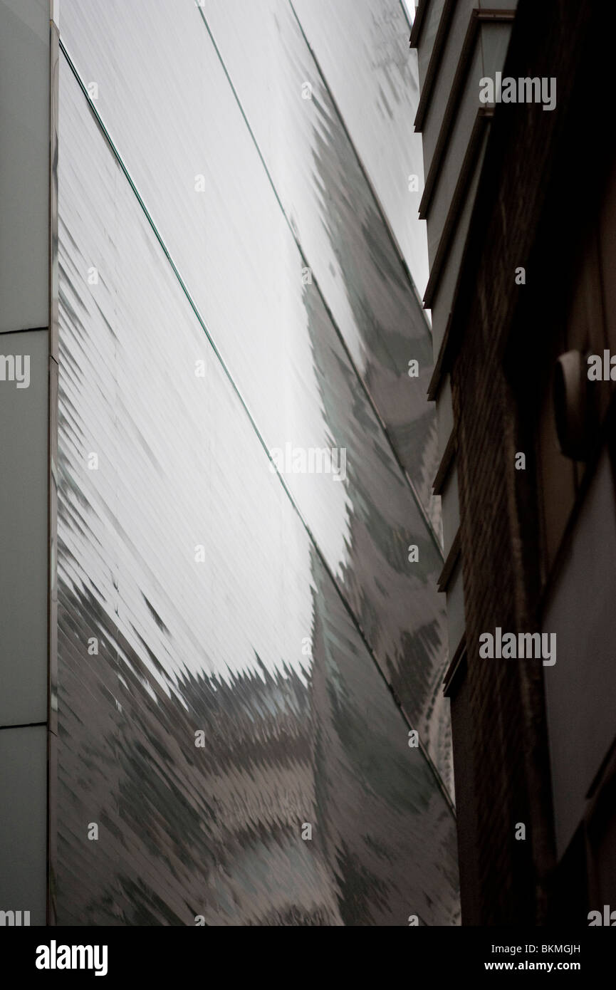Highly reflected surface of a building making an abstract image Stock Photo