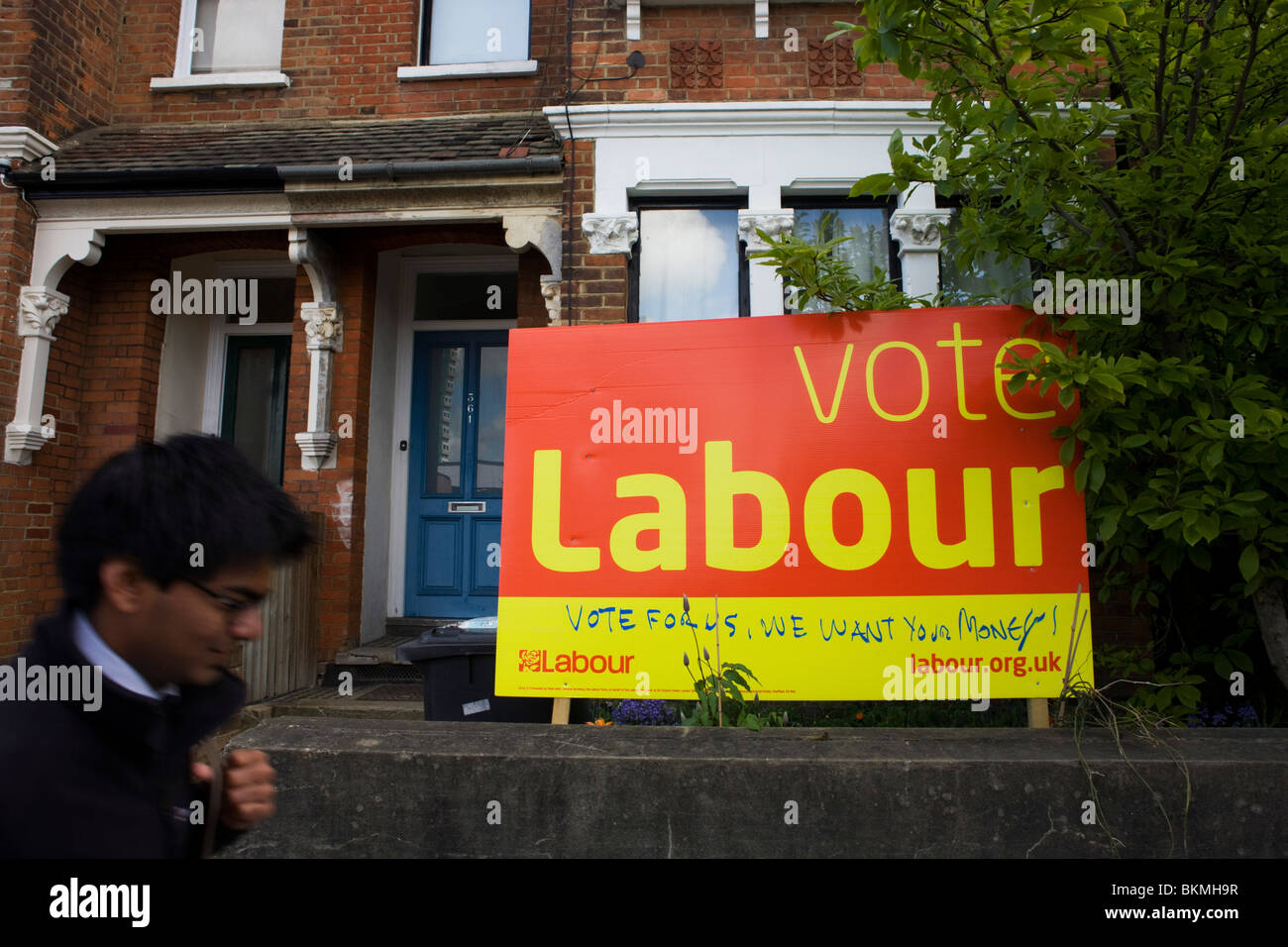 A defaced Labour Party poster is displayed in a front garden in Herne Hill, South London. Seat of Tessa Jowell MP. Stock Photo