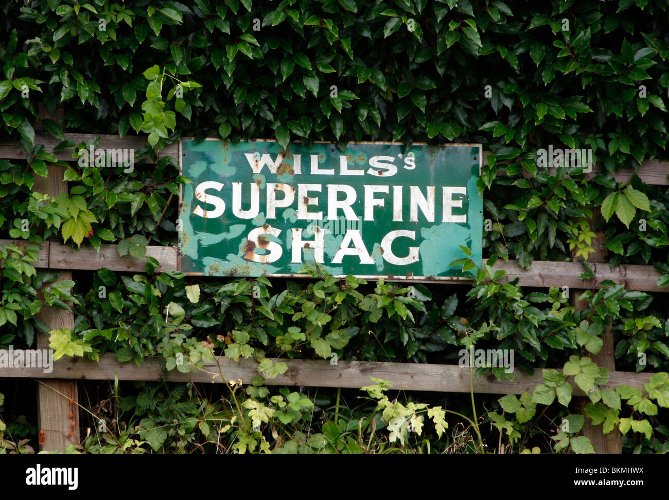 Wills Superfine Shag vintage advertising sign at the Bluebell Railway in Sussex Stock Photo