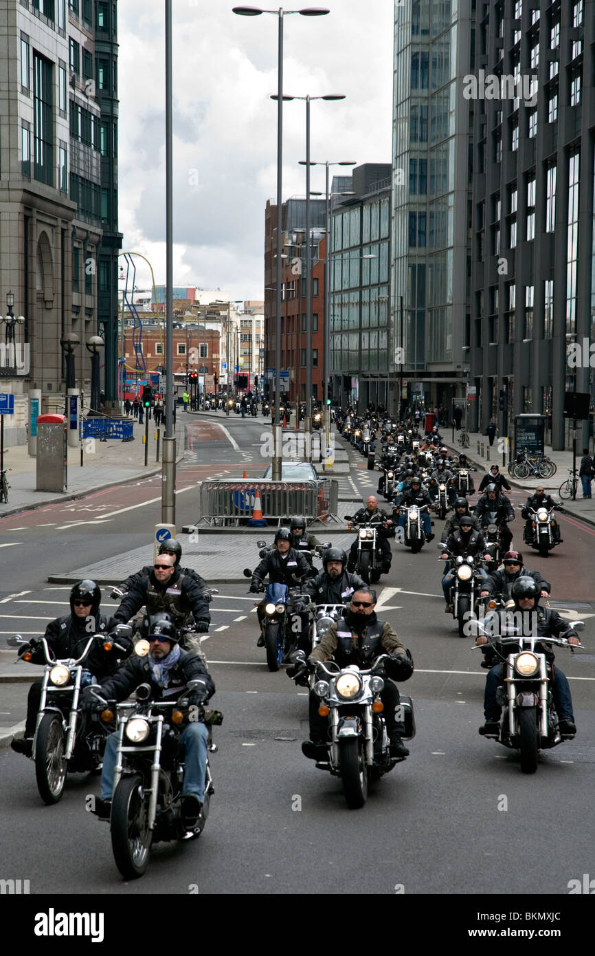hells angels driving through bishopsgate in the city of london Stock Photo