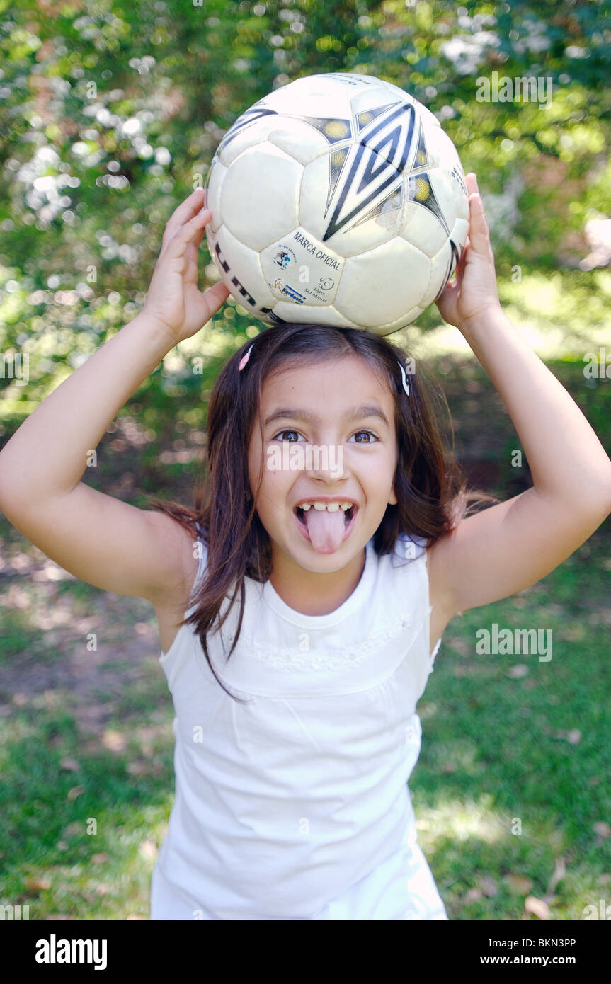 Girl playing with a soccer ball Stock Photo Alamy