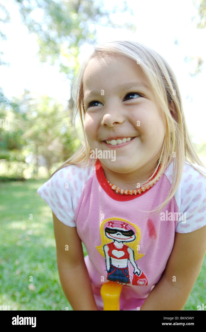 Posing happiness girl hi-res stock photography and images - Alamy