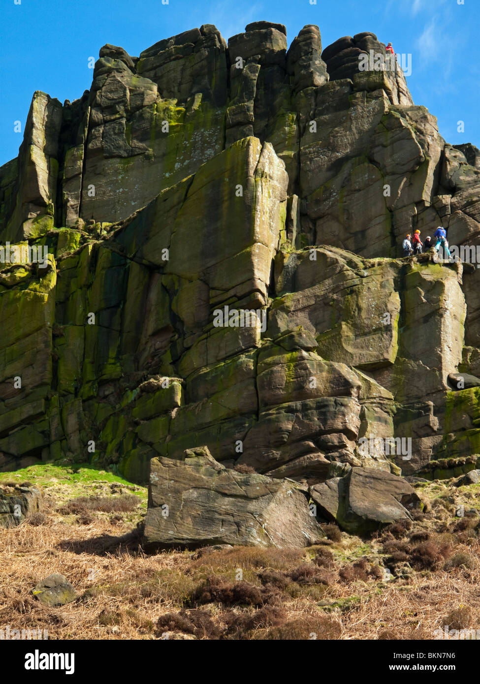 Rocky cliff face used by rock climbers at the summit of Hen Cloud near ...